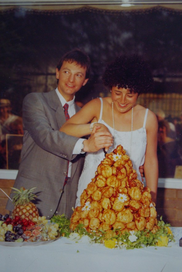 My parents cutting the cake.